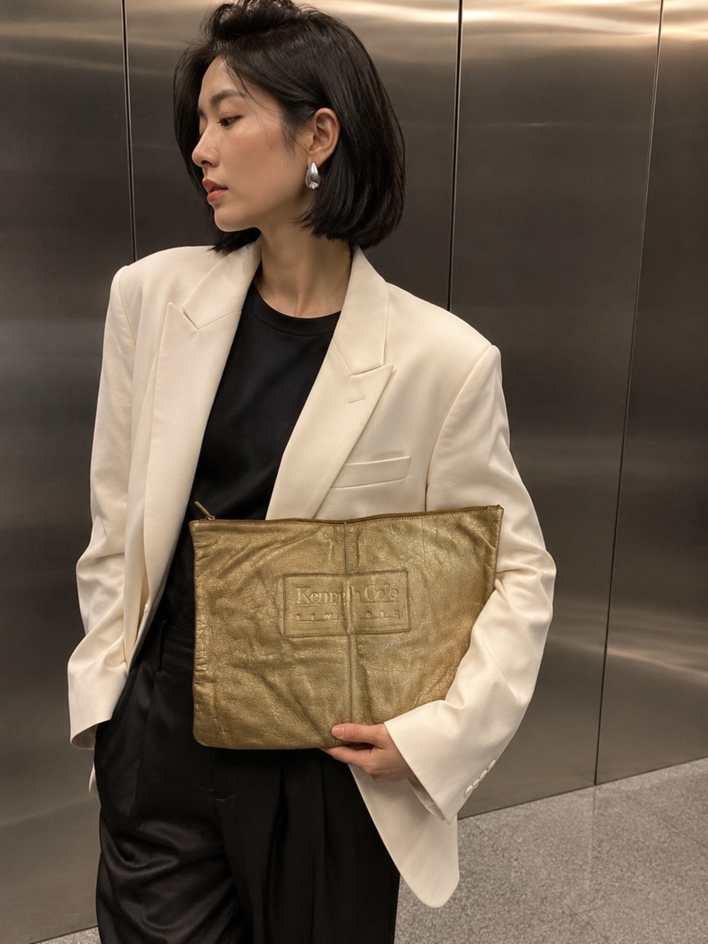 Kenneth Cole Gold Leather clutch bag